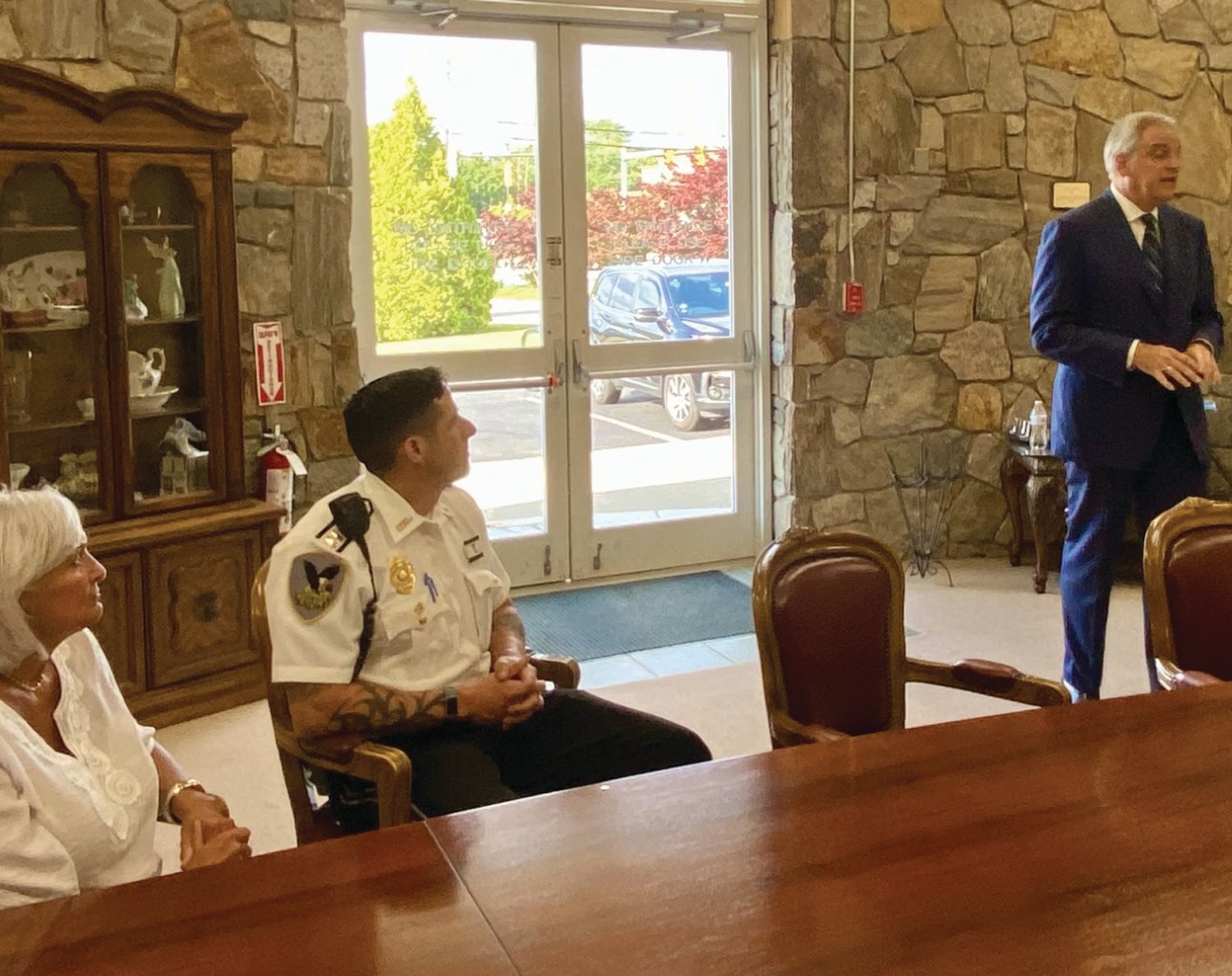 IMPORTANT ISSUES: Johnston Town Councilwomen Lauren Garzone and JPD Captain Mike Babbitt explain about the importance of the District 2 Neighborhood Watch committee during his recent and special visit.